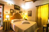 A bed or beds in a room at Podere Biagio