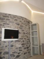 Televízia a/alebo spoločenská miestnosť v ubytovaní Hotel Borgovico
