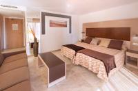 A bed or beds in a room at Hotel & SPA Dynastic