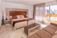 A bed or beds in a room at Hotel & SPA Dynastic