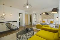 Postel nebo postele na pokoji v ubytování Boutique Apartments Blagoevgrad