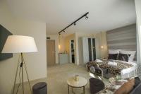 Postel nebo postele na pokoji v ubytování Boutique Apartments Blagoevgrad