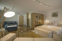 Postel nebo postele na pokoji v ubytování Boutique Apartments Blagoevgrad