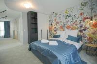 Postel nebo postele na pokoji v ubytování Boutique Apartments Blagoevgrad