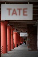 a sign for a cafe on a building with red columns at The Z Hotel Liverpool in Liverpool