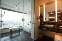 a bathroom with a shower and a tub and a sink at The Prince Gallery Tokyo Kioicho, a Luxury Collection Hotel in Tokyo