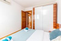 Postel nebo postele na pokoji v ubytování Apartments Lulic
