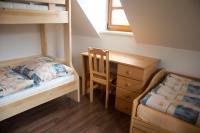 Postel nebo postele na pokoji v ubytování Apartment Říčky V Orlických Horách