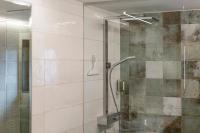 A bathroom at Das Hochegg - Apartments