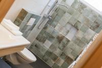 A bathroom at Das Hochegg - Apartments