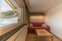 A seating area at Das Hochegg - Apartments