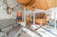 A seating area at Das Hochegg - Apartments