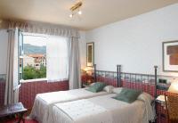 Postel nebo postele na pokoji v ubytování Hotel Avenida Real