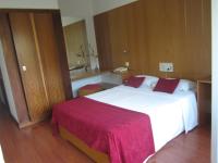 Postel nebo postele na pokoji v ubytování Hotel Eco Salvador