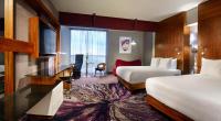 Hard Rock Hotel Guadalajaraにあるベッド