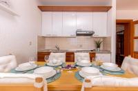 Kuchyň nebo kuchyňský kout v ubytování Apartments Lulic