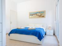 A bed or beds in a room at Villa Mariou