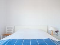 A bed or beds in a room at Villa Mariou