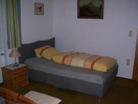 Łóżko lub łóżka w pokoju w obiekcie Log Home