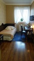 Postel nebo postele na pokoji v ubytování Oławian Hotel