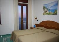 Posteľ alebo postele v izbe v ubytovaní Hotel Sporting