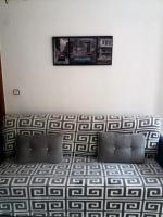Posedenie v ubytovaní AMAZING SUNNY FLAT WITH BALCONY POOL two MINS FROM THE BEACH