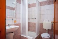 Łazienka w obiekcie Kőkapu Vadászkastély és Hotel & Apartments