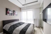 Łóżko lub łóżka w pokoju w obiekcie Exclusive Trendy Apartments