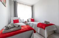 Posteľ alebo postele v izbe v ubytovaní Apartament Metropolia typu deluxe, free WiFi, FV