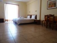 Łóżko lub łóżka w pokoju w obiekcie Elafonisos Diamond Resort