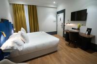 A bed or beds in a room at Soho Boutique Congreso