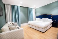 A bed or beds in a room at Soho Boutique Congreso