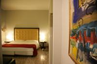 Posteľ alebo postele v izbe v ubytovaní Hotel Piazza Marconi