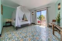 Posteľ alebo postele v izbe v ubytovaní Apartamentos Turisticos Bahia De Trafalgar