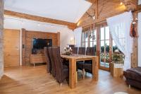 Televízia a/alebo spoločenská miestnosť v ubytovaní Appartement Kichelerhof