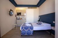 Posteľ alebo postele v izbe v ubytovaní Elisir Suite Rooms by Marino Tourist