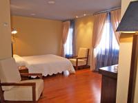 Posteľ alebo postele v izbe v ubytovaní Hostal Fuentefria
