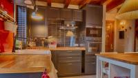 Kuchyňa alebo kuchynka v ubytovaní Saplan Real Estate CUMA
