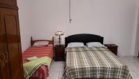 Residencia Leones de Castillaにあるベッド