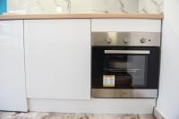 Kuchyňa alebo kuchynka v ubytovaní Leiland #colony_White_Tower_Suite