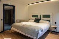 Postel nebo postele na pokoji v ubytování Hotel Alda Jolio Jaca