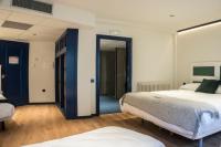 Postel nebo postele na pokoji v ubytování Hotel Alda Jolio Jaca