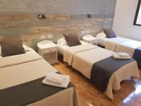 Postel nebo postele na pokoji v ubytování Hotel Horizonte