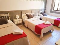 Postel nebo postele na pokoji v ubytování Hotel Horizonte