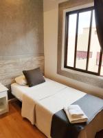 Postel nebo postele na pokoji v ubytování Hotel Horizonte