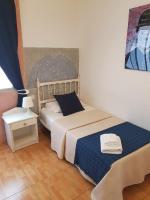 Postel nebo postele na pokoji v ubytování Hotel Horizonte