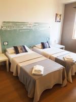 Postel nebo postele na pokoji v ubytování Hotel Horizonte