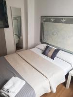 Postel nebo postele na pokoji v ubytování Hotel Horizonte