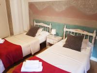 Postel nebo postele na pokoji v ubytování Hotel Horizonte