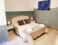 Postel nebo postele na pokoji v ubytování Hotel Horizonte